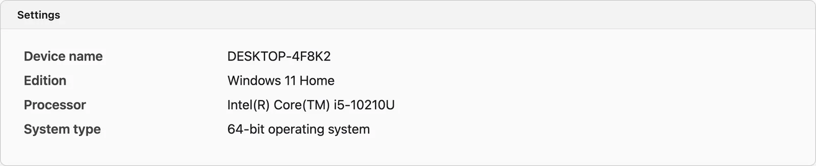Windows 的 Settings（设置）页面：System（系统）里的 About（关于），显示 Windows 11 Home